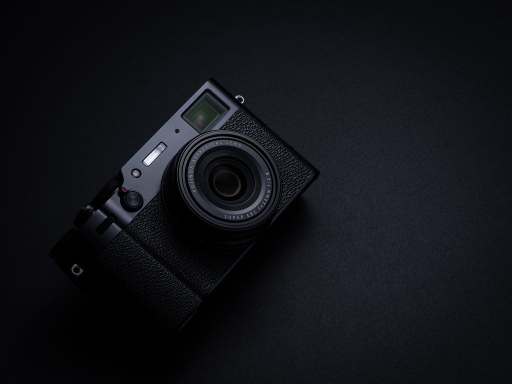 FUJIFILM X100V black black background still 24 scaled